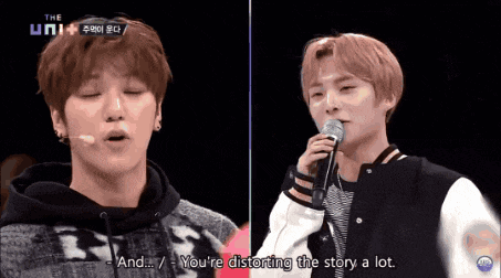 a young man singing into a microphone with the words " and you 're distorting the story a lot "