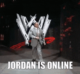a man in a suit and tie is standing on a stage with the words jordan is online written below him