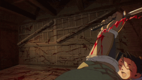 a person is laying on the floor with blood coming out of their wrist