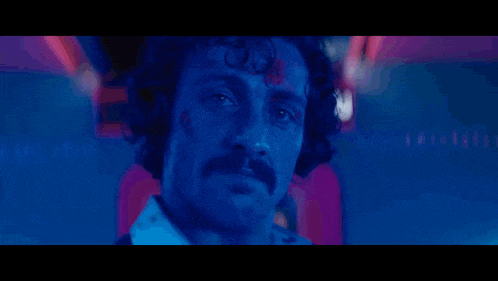 a man with a mustache says " and lemon never bleeds " in yellow letters