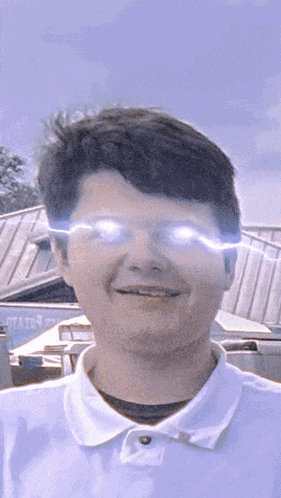 a man in a white shirt has a light coming out of his eye