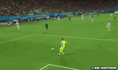 a soccer player kicking a ball on a field with a sb nation logo on the bottom
