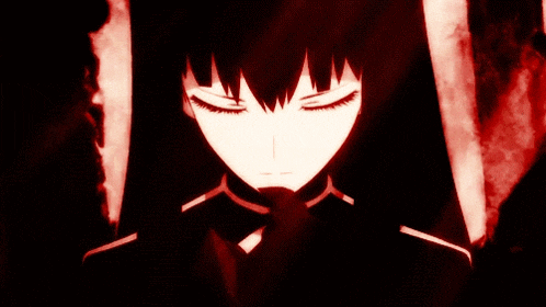 a silhouette of a devil with horns stands in front of a pile of rocks