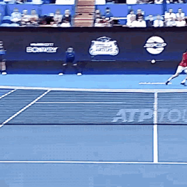 a tennis court with a sign that says atp tour