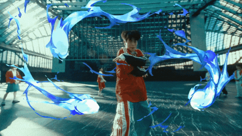 a person in a red and white adidas outfit is surrounded by blue waves