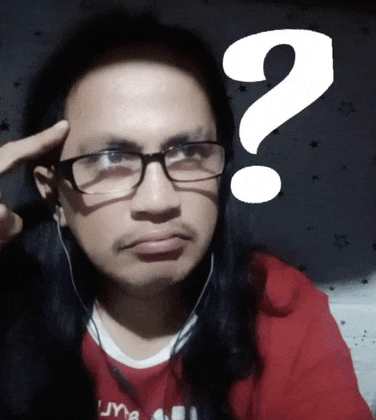 a man wearing glasses and a red shirt has a question mark on his forehead