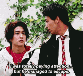 two men are standing next to each other and one of them is saying " i was totally paying attention "
