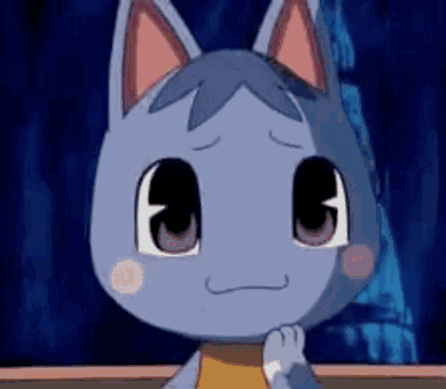 a close up of a cartoon cat with a sad expression on its face .