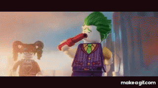 Lego Joker GIF - Lego Joker Joker Putting On Lipstick GIFs