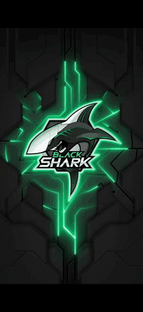 a black shark logo that is glowing green
