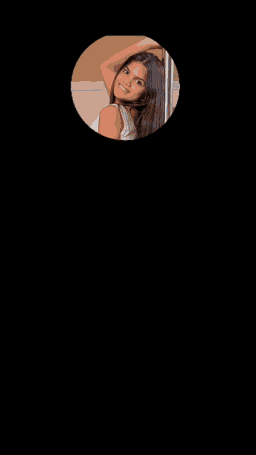 a woman is smiling in a circle on a black background .