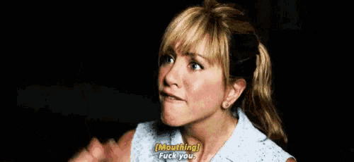 a woman is giving the middle finger and saying `` mouthing fuck you '' .