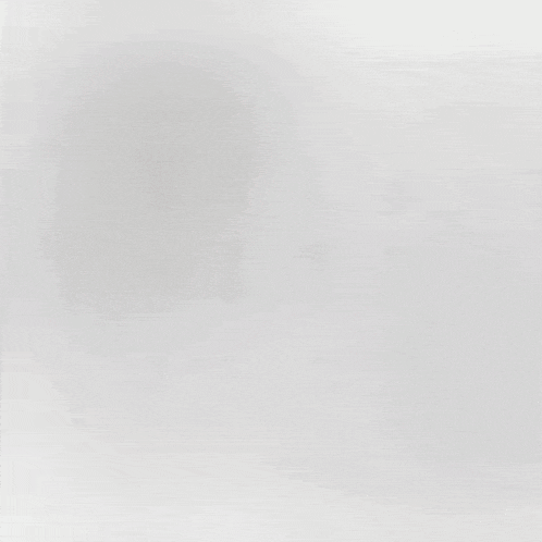 a bunch of different types of screws and balls on a white background