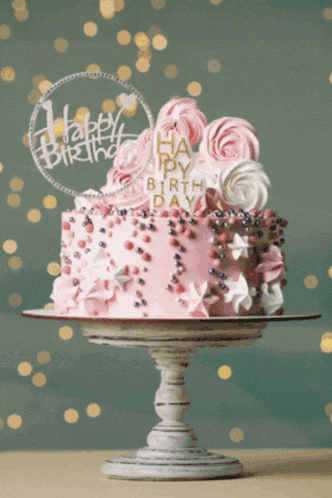 a birthday cake with a happy birthday topper on top