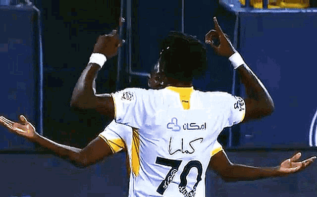 a soccer player with the number 70 on his shirt