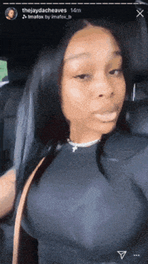 a woman is taking a selfie in a car with the name thejaydacheaves