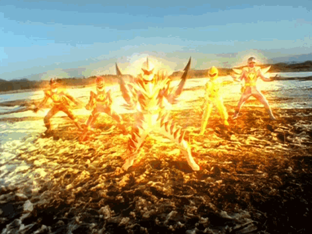 a group of cartoon characters are standing on a beach with their arms outstretched