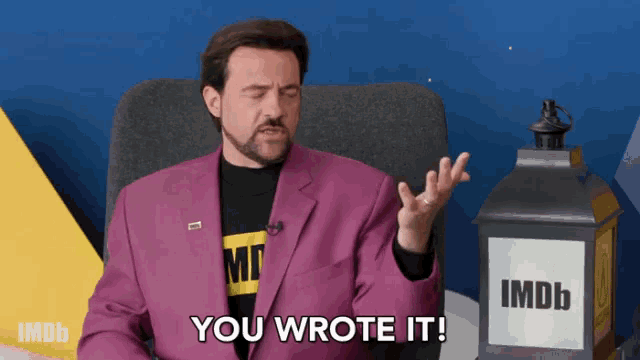 a man in a purple suit says you wrote it in front of an imdb logo