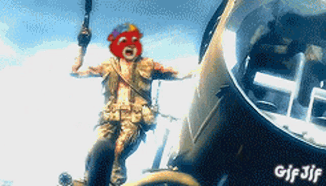 a gif of a man jumping out of a helicopter with the words gif jif on the bottom