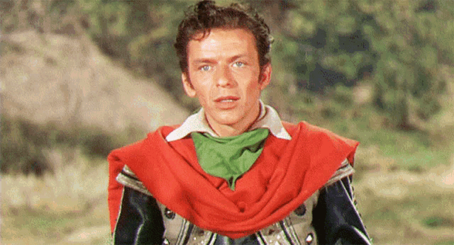 a man with a red scarf around his neck