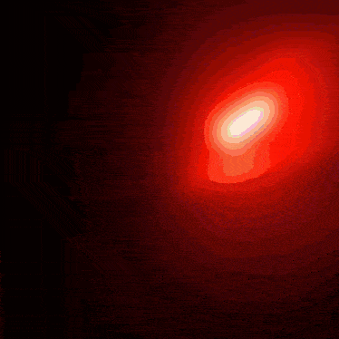 a red background with a white circle in the center