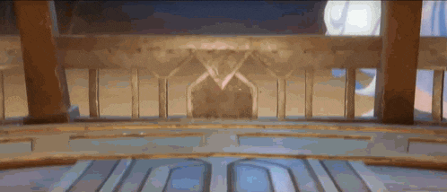 an empty room with a wooden fence and a blue floor