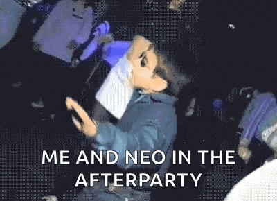 a young boy is wearing sunglasses and dancing in a club .
