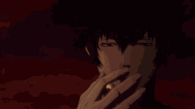 a man smoking a cigarette with a red background