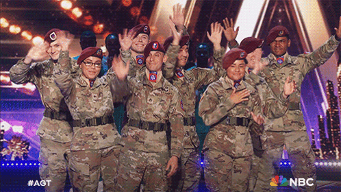 Waving 82nd Airborne Chorus GIF - Waving 82nd Airborne Chorus America'S Got Talent GIFs