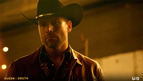 a man wearing a cowboy hat and a leather jacket is featured in a queen of the south ad