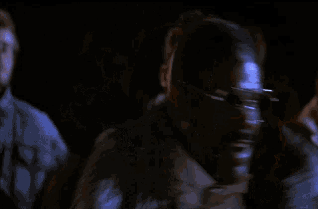 a man with glasses and a fur coat says fight back
