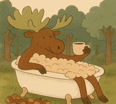 a moose is taking a bath in a tub and drinking a cup of coffee