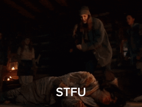 a person standing in front of a fireplace with stfu written on the bottom of the image