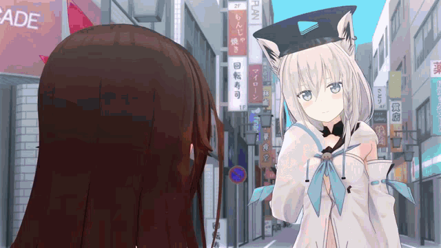 a girl with a cat ear is standing next to another girl in front of arcade signs