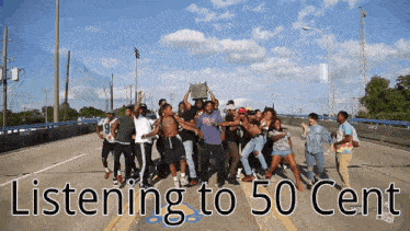 a group of people dancing on a highway with the words listening to 50 cent written below them