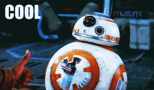 a bb-8 robot is being pointed at by a person with the word cool written on it
