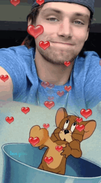 a man is surrounded by hearts and a picture of jerry and tom