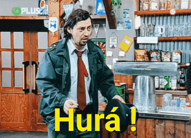 a man in a suit and tie is standing in front of a sign that says hura on it