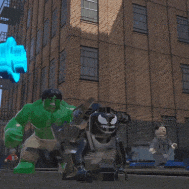 hulk and venom are playing a video game with a brick building in the background