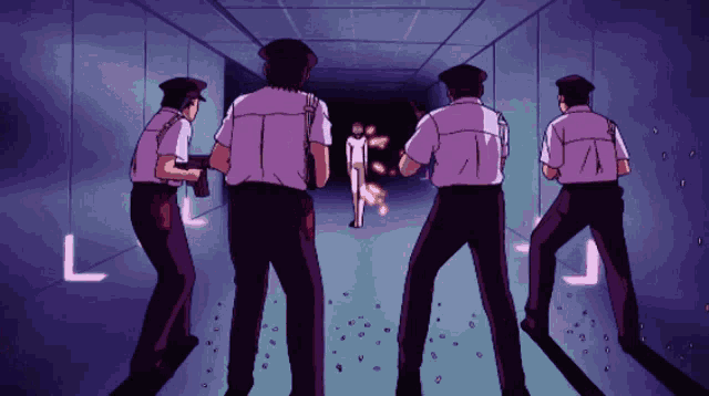 a group of police officers standing in a hallway with the letter l on the wall behind them