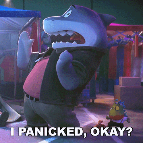 a cartoon character says i panicked okay in front of a shark