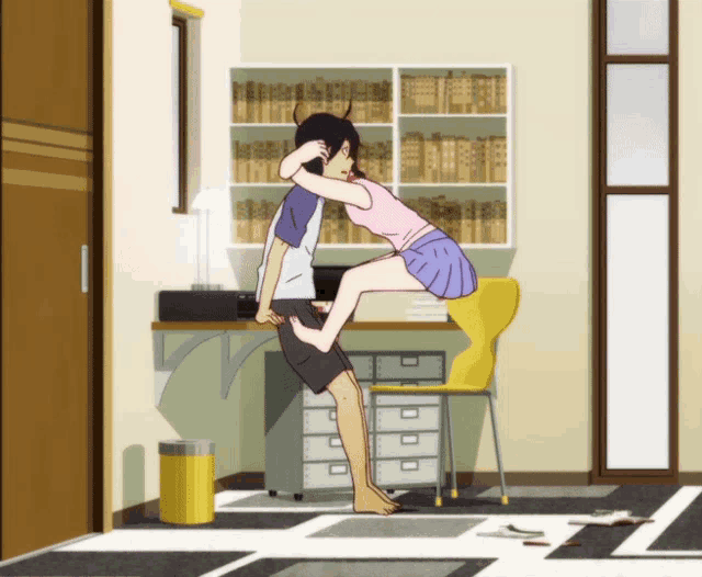 a man is carrying a girl in his arms in a room