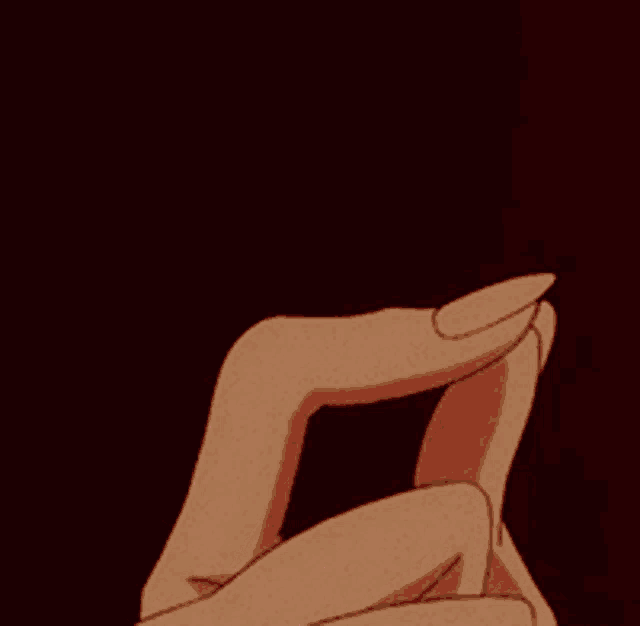 a close up of a person holding a pink lightning bolt in their hands