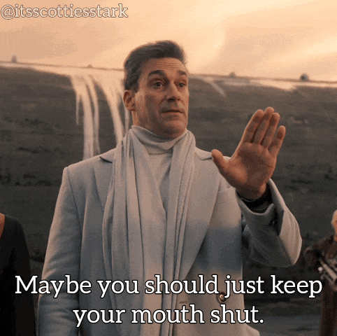 a man with a scarf around his neck says maybe you should just keep your mouth shut