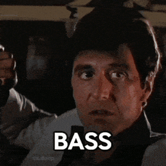 a man with a cigar in his mouth and the word bass on his chest