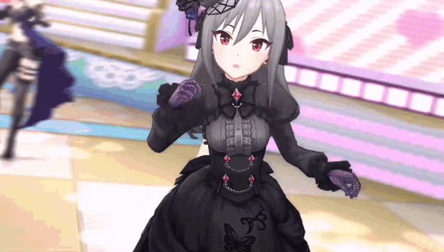 a girl in a black dress has a butterfly on her dress