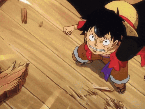 a cartoon character with a straw hat is standing on a wooden surface