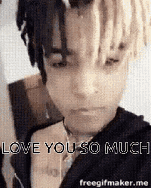 a close up of a person 's face with dreadlocks and the words `` love you so much '' .
