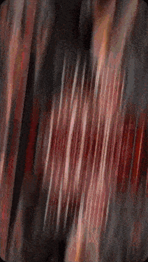 a blurred image of a dark room with a few red lines
