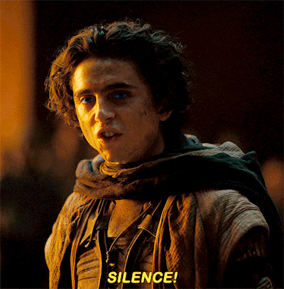a man with a scarf around his neck is screaming with the word silence written below him